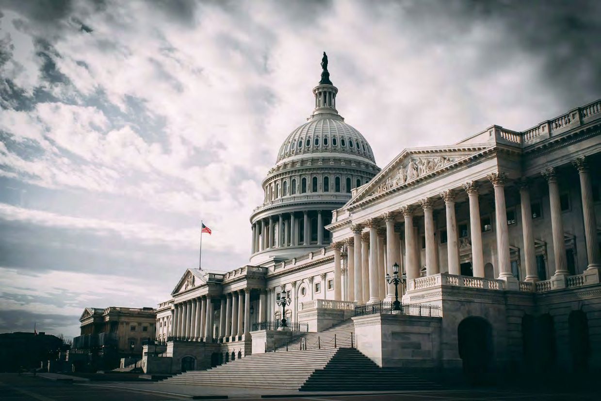 US Capitol Building with cloudy sky